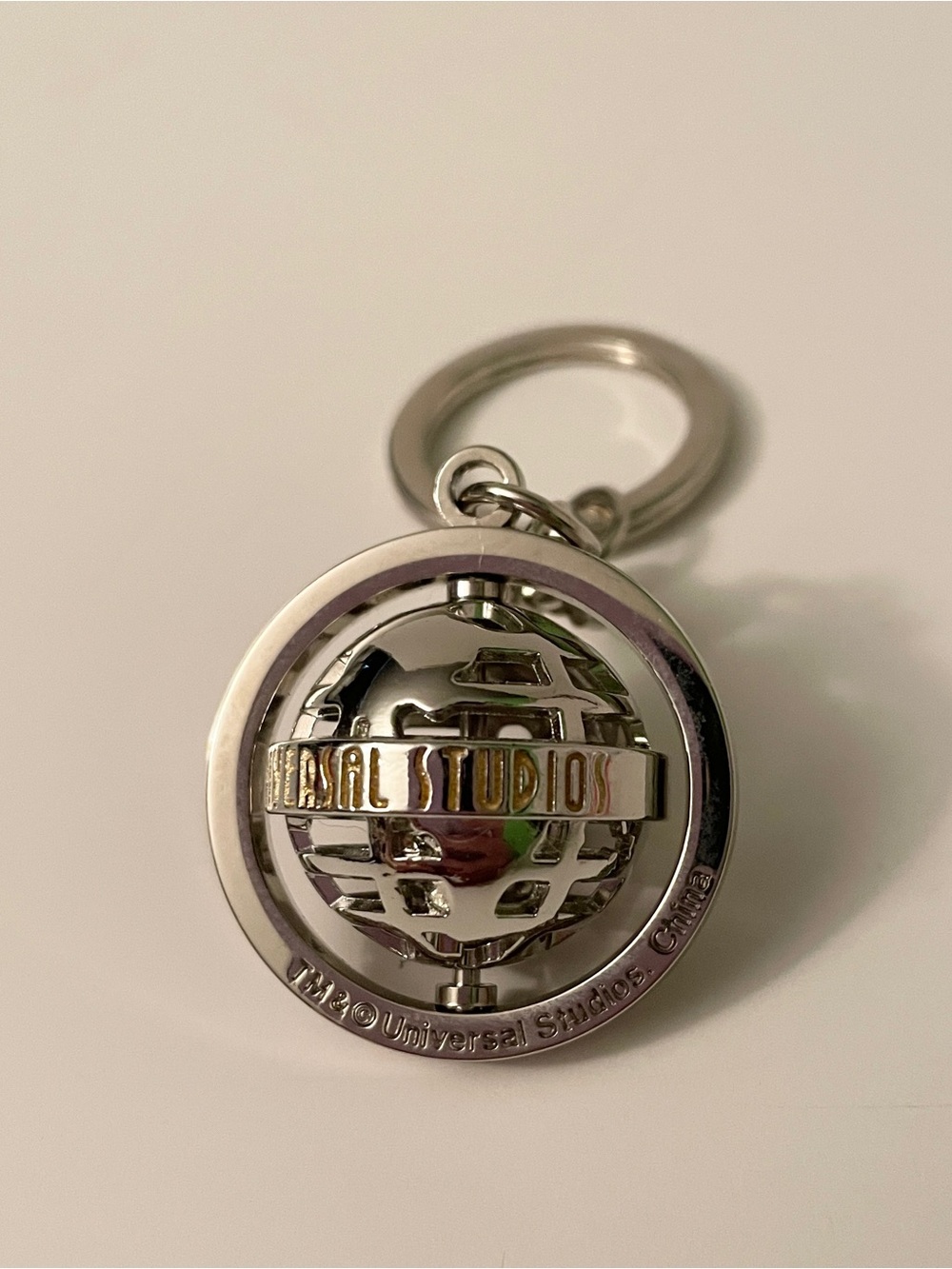 Universal Studios Spinning Globe Silver Metal Keychain Key Ring⁠